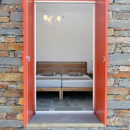 The Fiery Red House, Close To The Beach In The Area Of Otzia On The Island Of Kea Ioulis